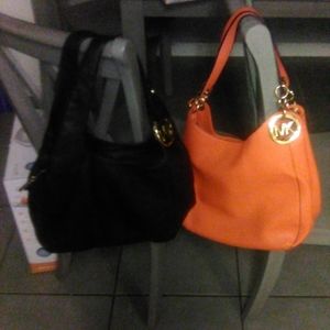 2 Michael Kors purses